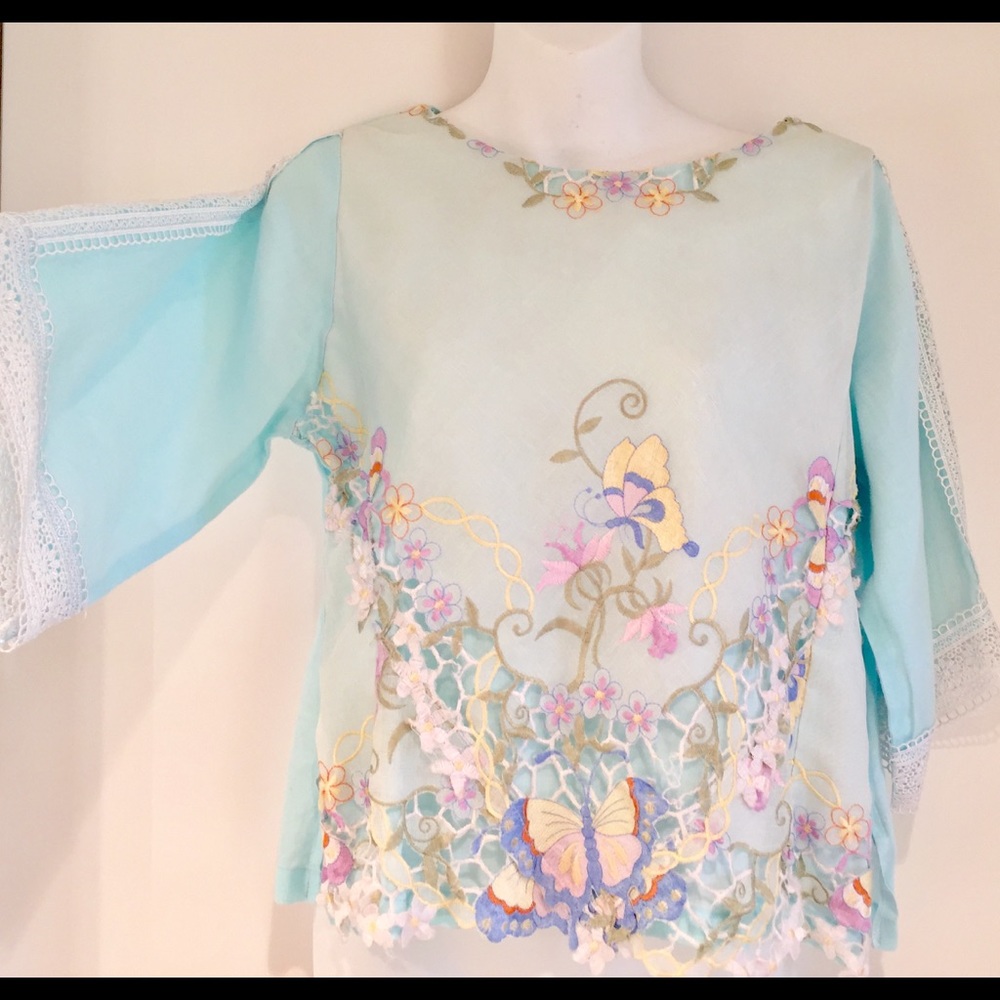 Blue linen blouse with embroidered
